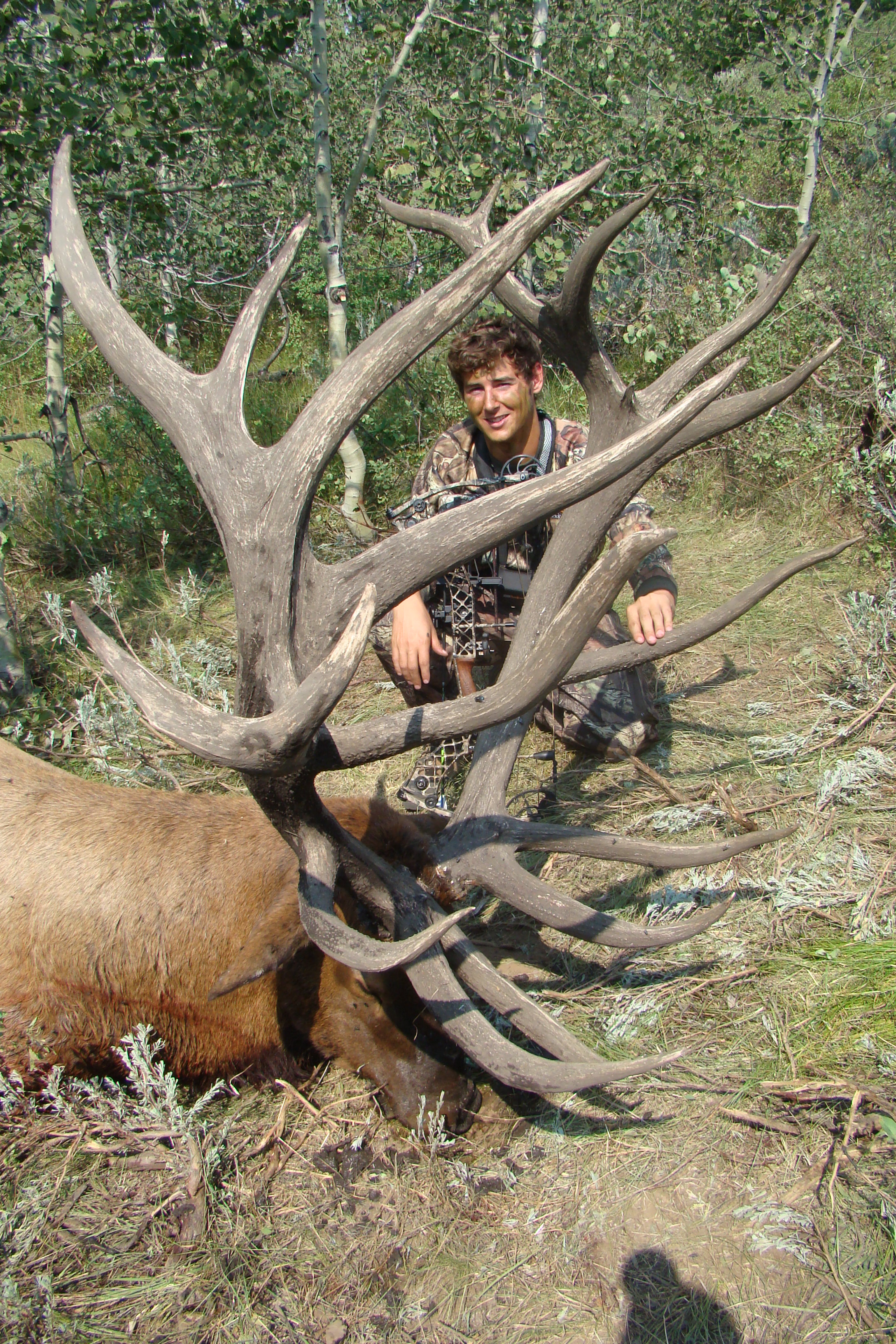 Michael Rutland with this giant 566" World Record Archery Bull Elk tak...